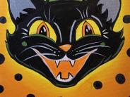 Painting of large black cartoon cat face with green party hat on over an orange background with black dots.
